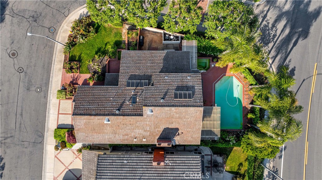 9 Hermosa Irvine, CA 92620 - Photo 17 of 20 a aerial view of a house with a yard and potted plants
