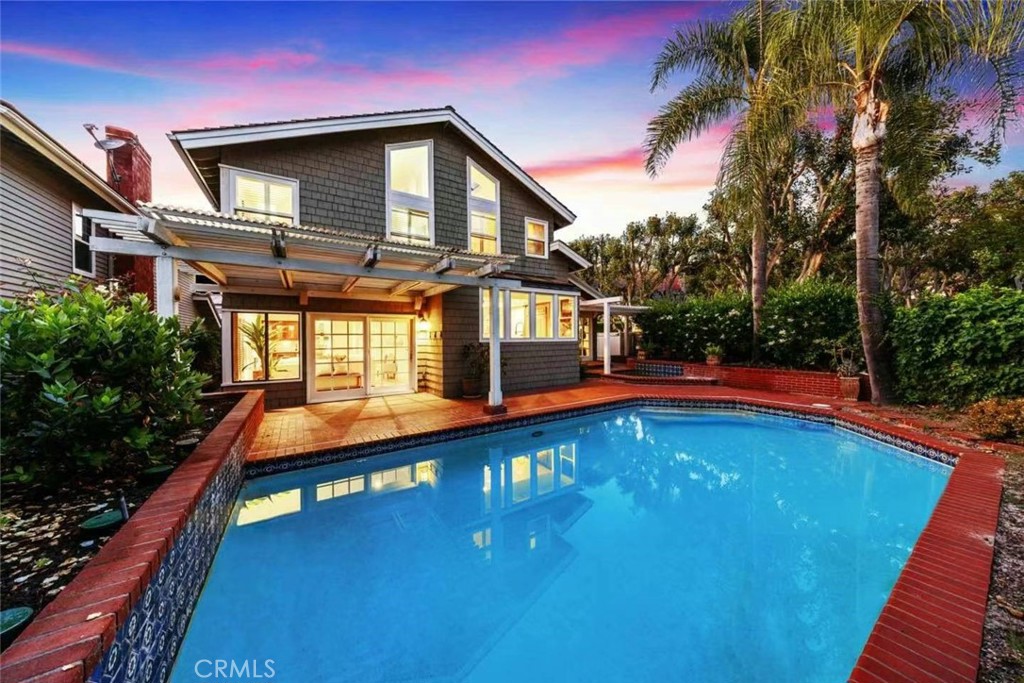 9 Hermosa Irvine, CA 92620 - Photo 2 of 20 a front view of house with yard and swimming pool