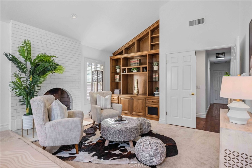 9 Hermosa Irvine, CA 92620 - Photo 6 of 20 a living room with furniture and a potted plant