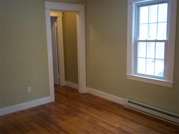 222 Turkey Hill Road Rutland, MA 01543 - Photo 13 of 30 an empty room with wooden floor and windows