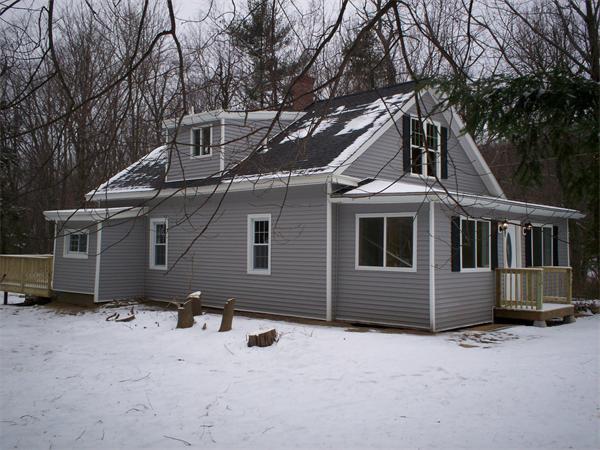 222 Turkey Hill Road Rutland, MA 01543 - Photo 3 of 30 a front view of a house with a yard