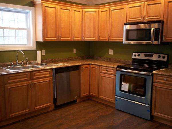 222 Turkey Hill Road Rutland, MA 01543 - Photo 4 of 30 a kitchen with granite countertop a sink stainless steel appliances and cabinets