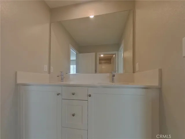 a view of an empty room with windows