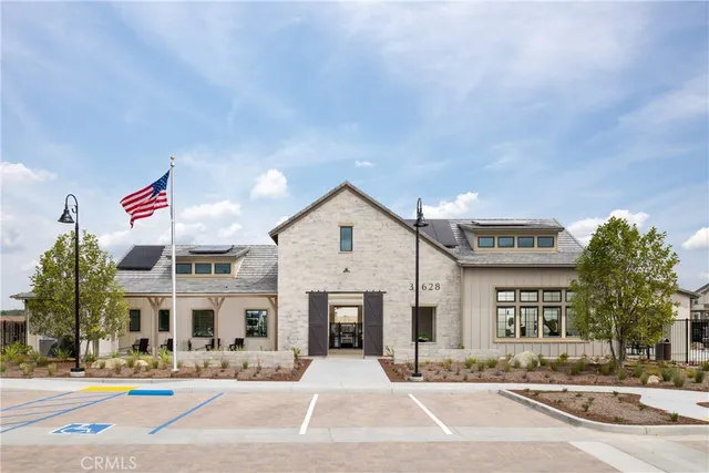 a view of multiple houses with a street