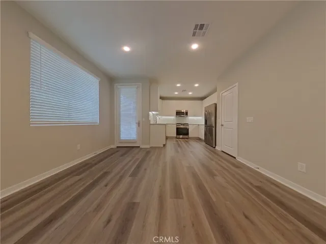 a view of livingroom with furniture and a window
