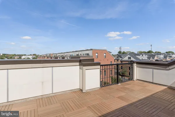 a view of a balcony with an outdoor space