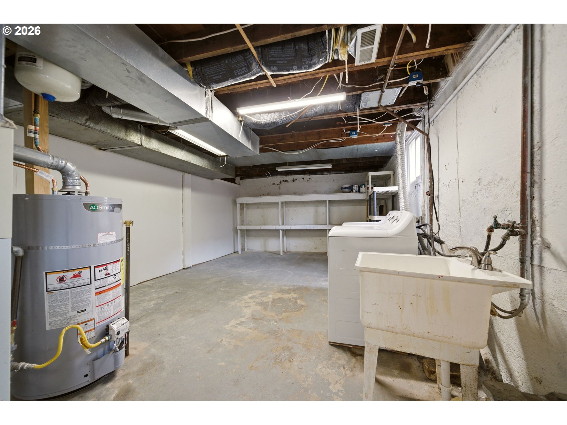 1804 Division Street Camas, WA 98607 - Photo 36 of 43 a utility room with dryer and washer