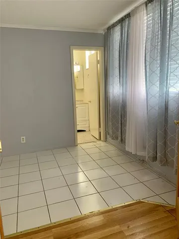 a view of a livingroom with wooden floor