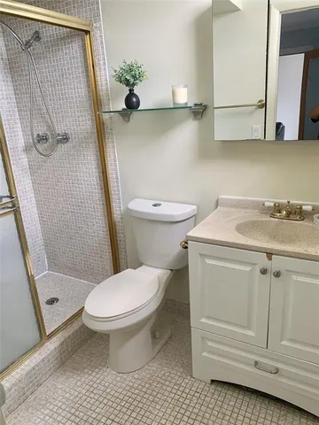 a bathroom with a toilet and a sink