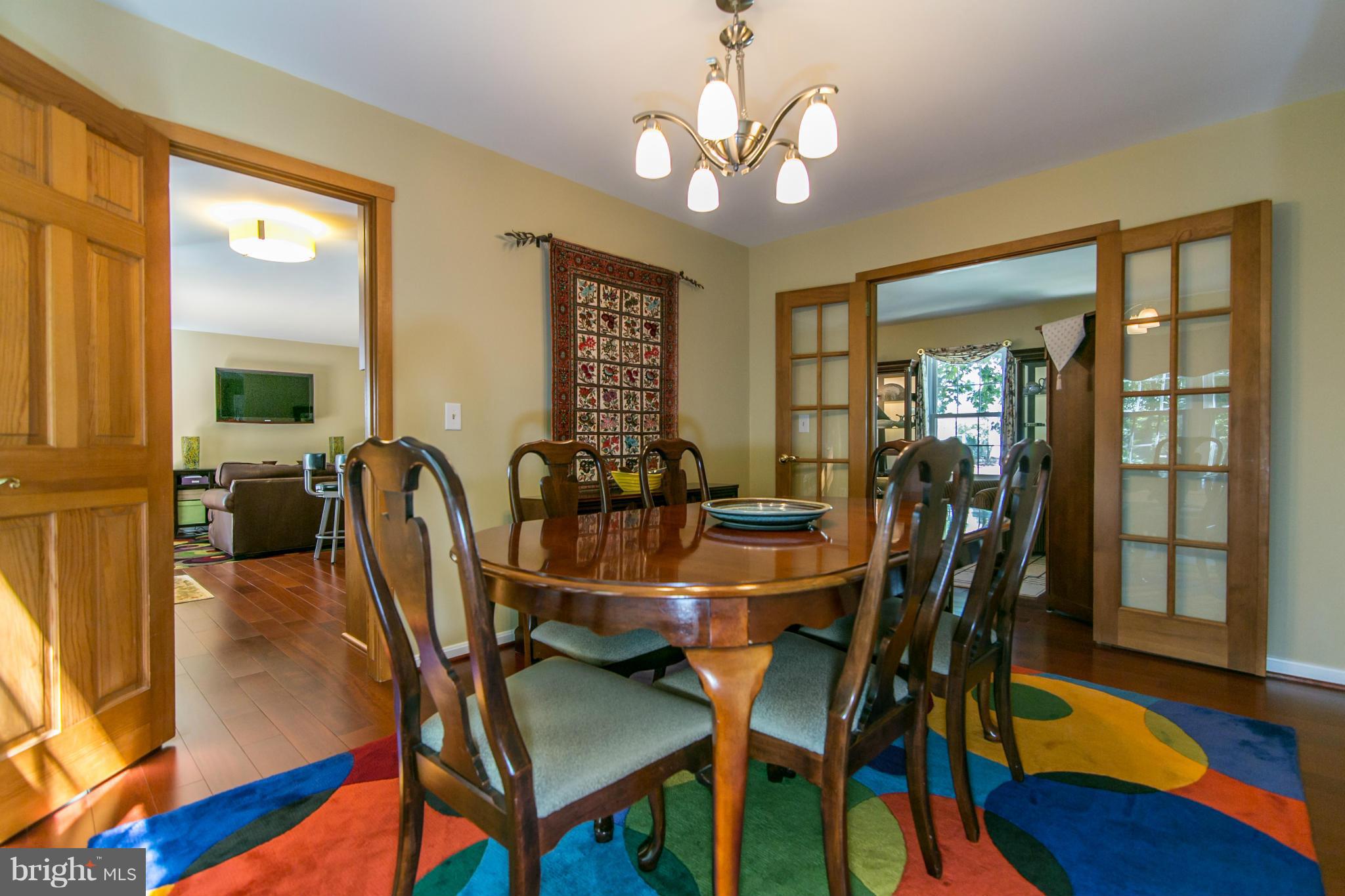 402 Spring Ridge Court Sterling, VA 20164 - Photo 6 of 30 Glass French door lead to the dining room.