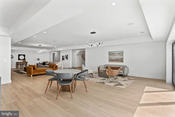 a living room with furniture and a table