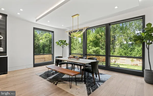 a dining room with furniture window wooden floor