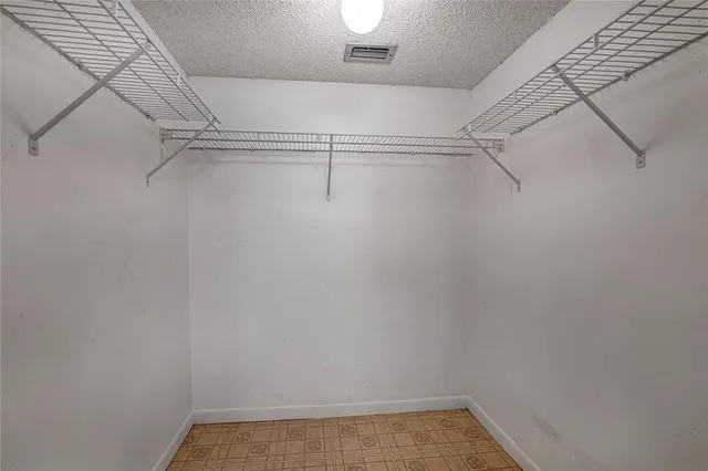 a view of a room with racks on the wall