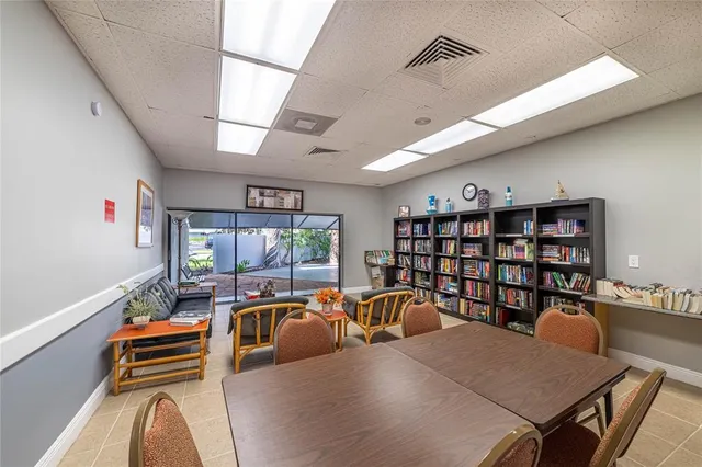 a view of a workspace with furniture
