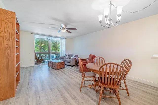 a outdoor space with patio furniture and wooden floor