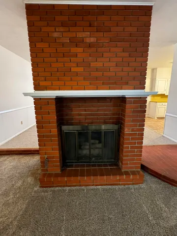 a living room with a fireplace