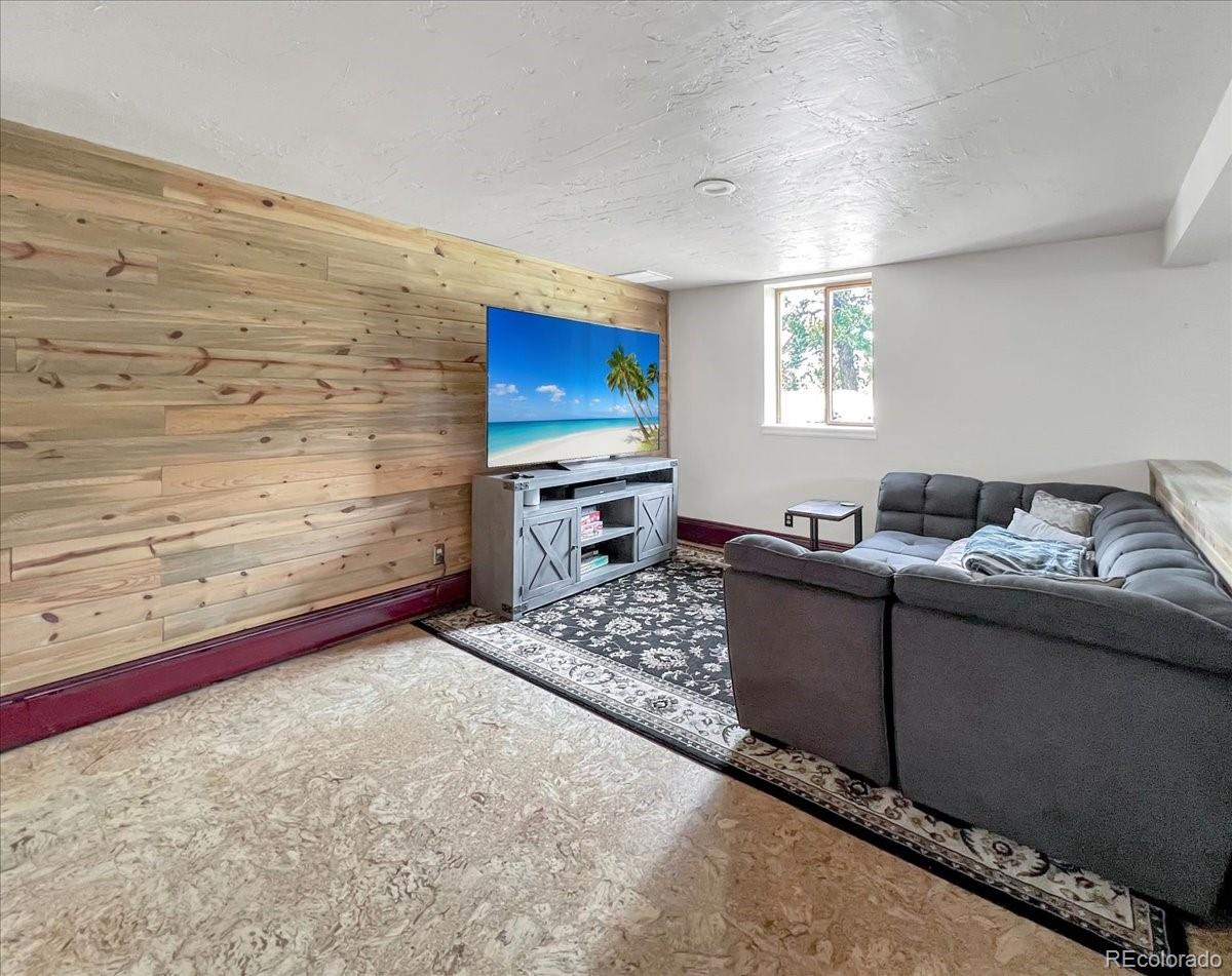 22155 Cook Lane Morrison, CO 80465 - Photo 17 of 28 a living room with furniture