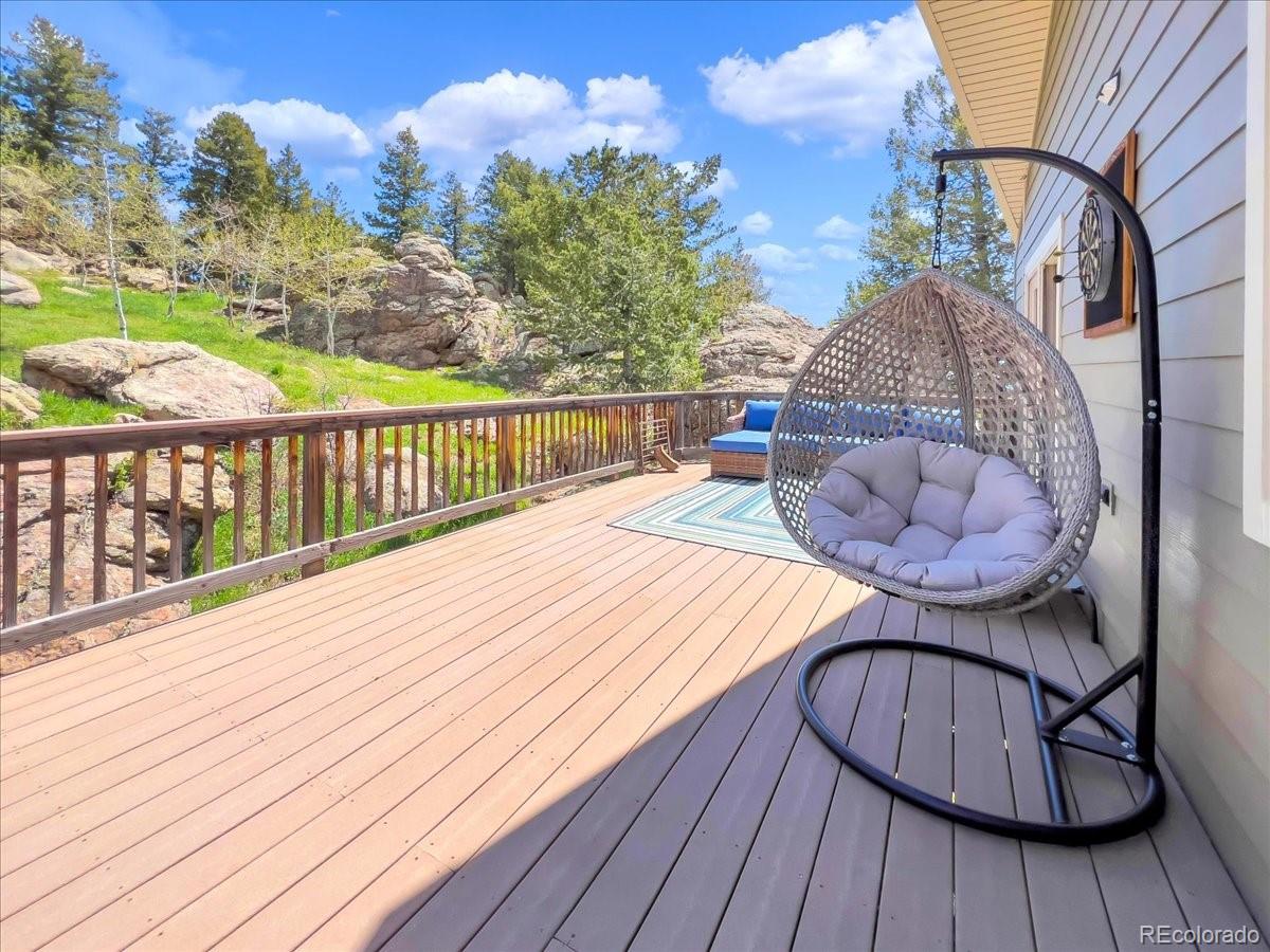 22155 Cook Lane Morrison, CO 80465 - Photo 23 of 28 a view of balcony with wooden floor
