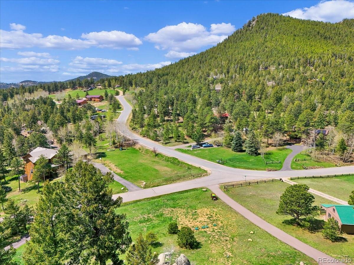 22155 Cook Lane Morrison, CO 80465 - Photo 26 of 28 a view of a field with an tree