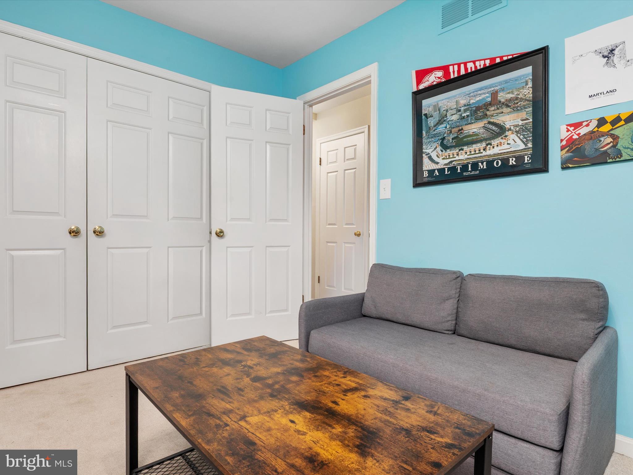 1711 Peartree Lane Crofton, MD 21114 - Photo 34 of 65 a living room with furniture and a table
