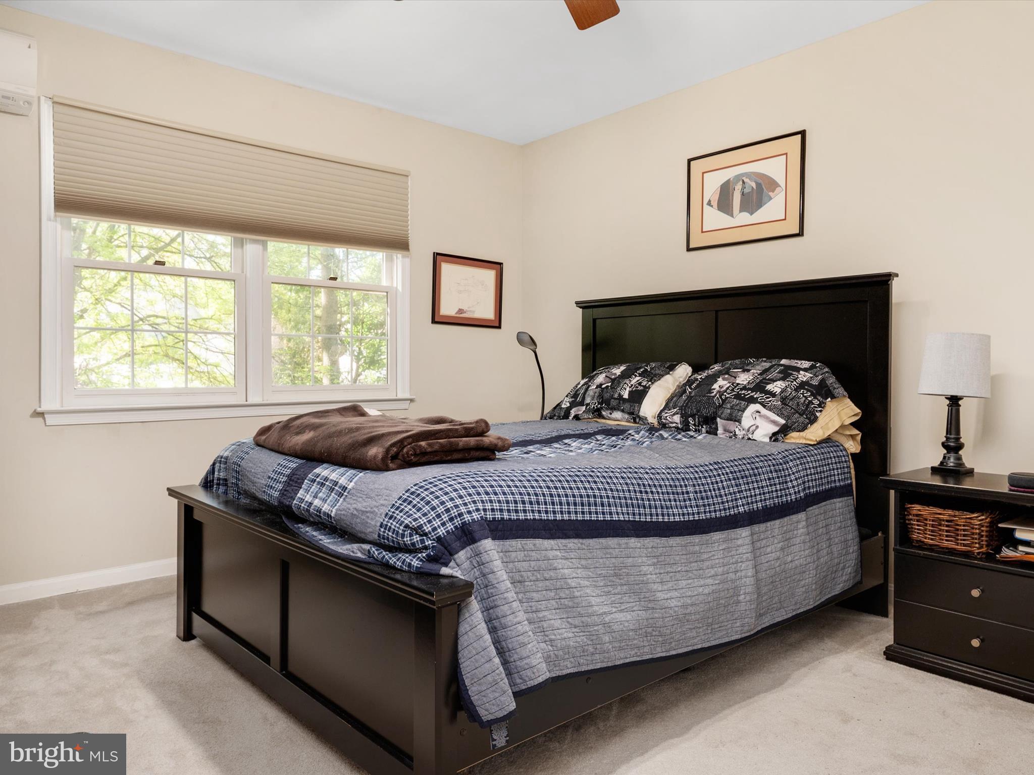 1711 Peartree Lane Crofton, MD 21114 - Photo 37 of 65 a bedroom with a bed and window