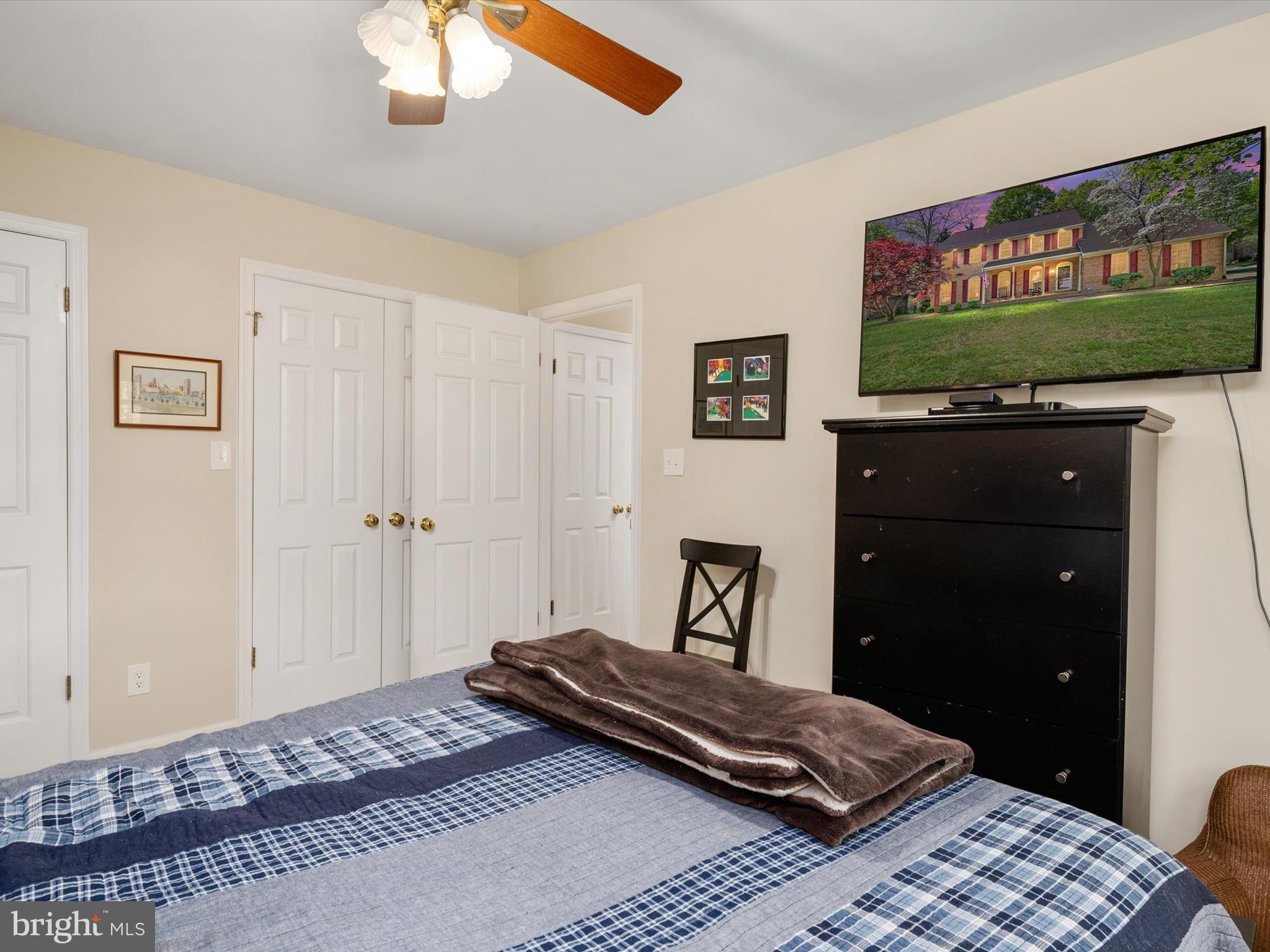 1711 Peartree Lane Crofton, MD 21114 - Photo 38 of 65 a bedroom with a bed and a window