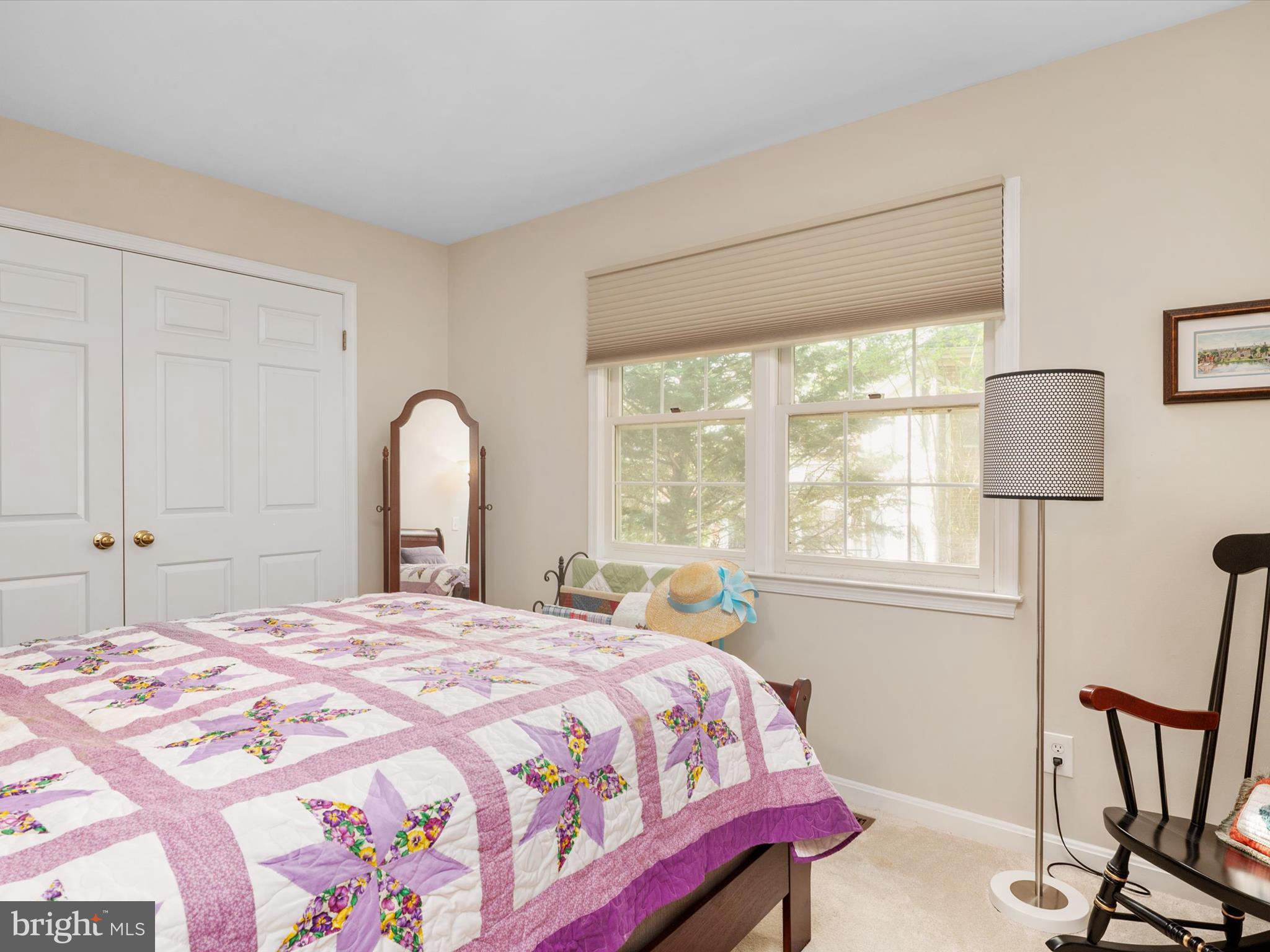 1711 Peartree Lane Crofton, MD 21114 - Photo 39 of 65 a bedroom with a bed and a large window