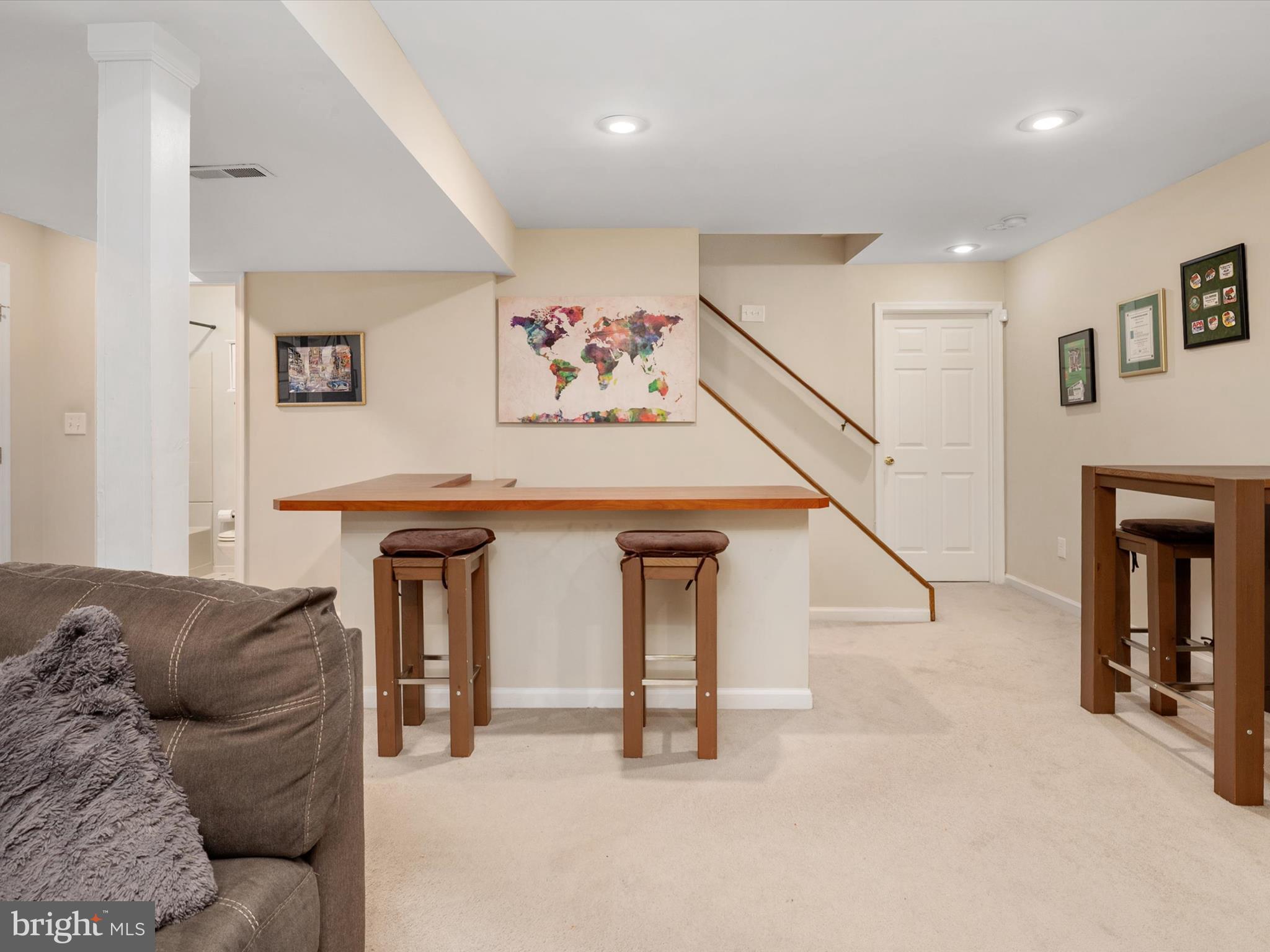 1711 Peartree Lane Crofton, MD 21114 - Photo 40 of 65 a living room with furniture and a ceiling fan