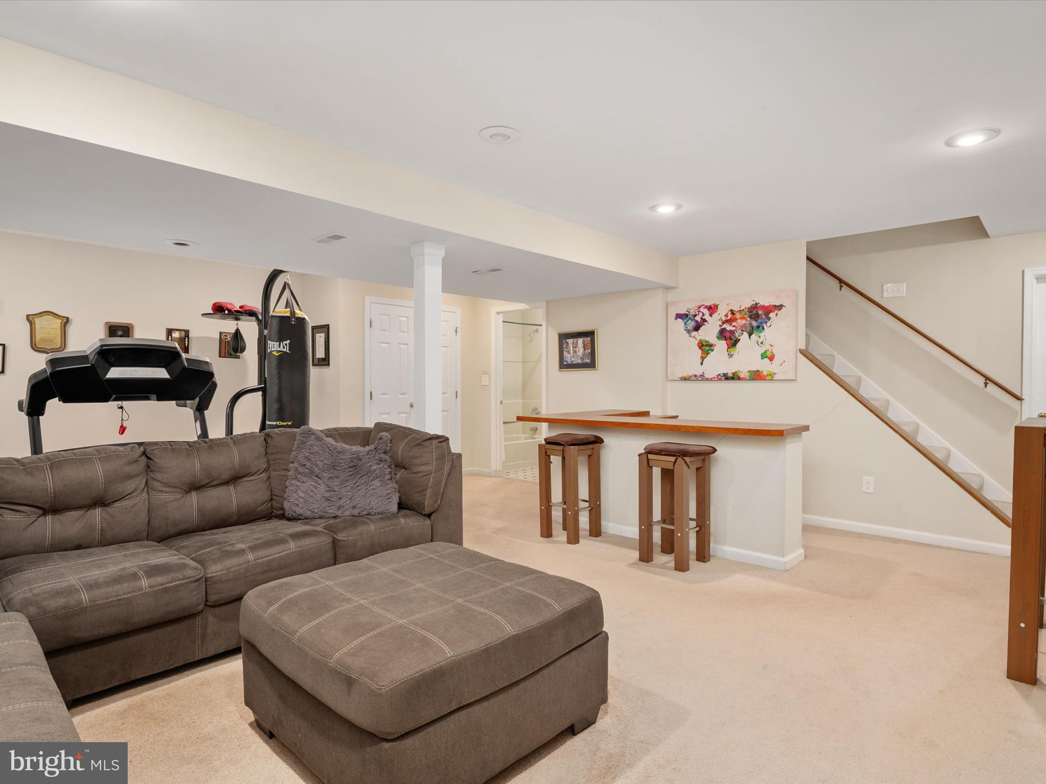 1711 Peartree Lane Crofton, MD 21114 - Photo 41 of 65 a living room with furniture and kitchen view