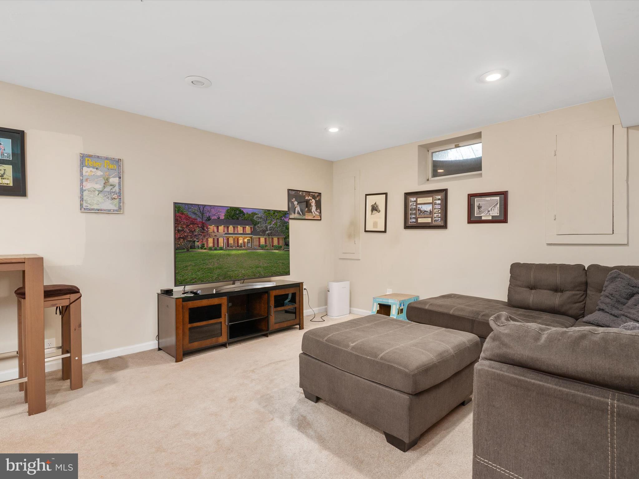 1711 Peartree Lane Crofton, MD 21114 - Photo 43 of 65 a living room with furniture and a flat screen tv