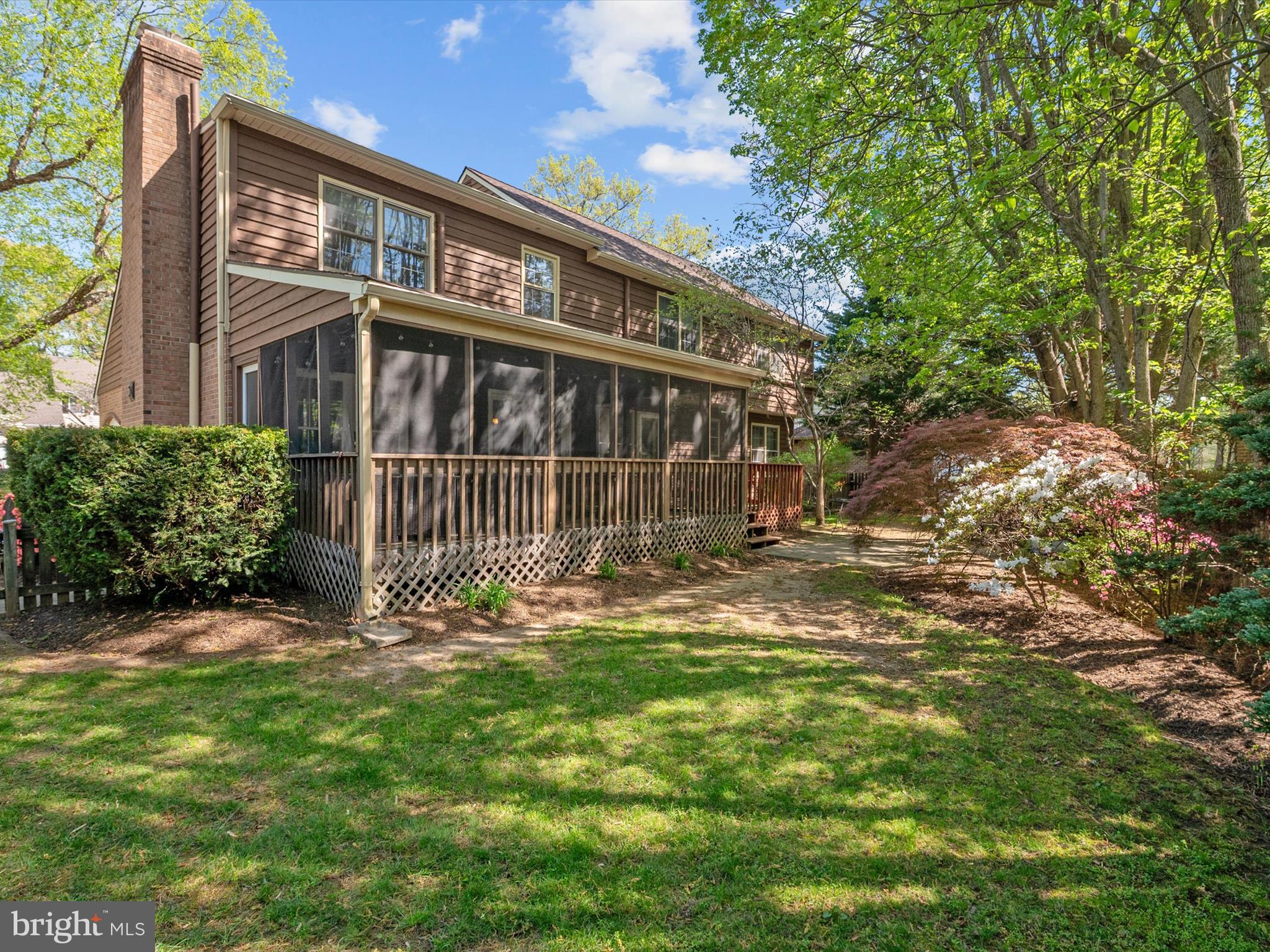 1711 Peartree Lane Crofton, MD 21114 - Photo 47 of 65 a front view of house with yard and green space