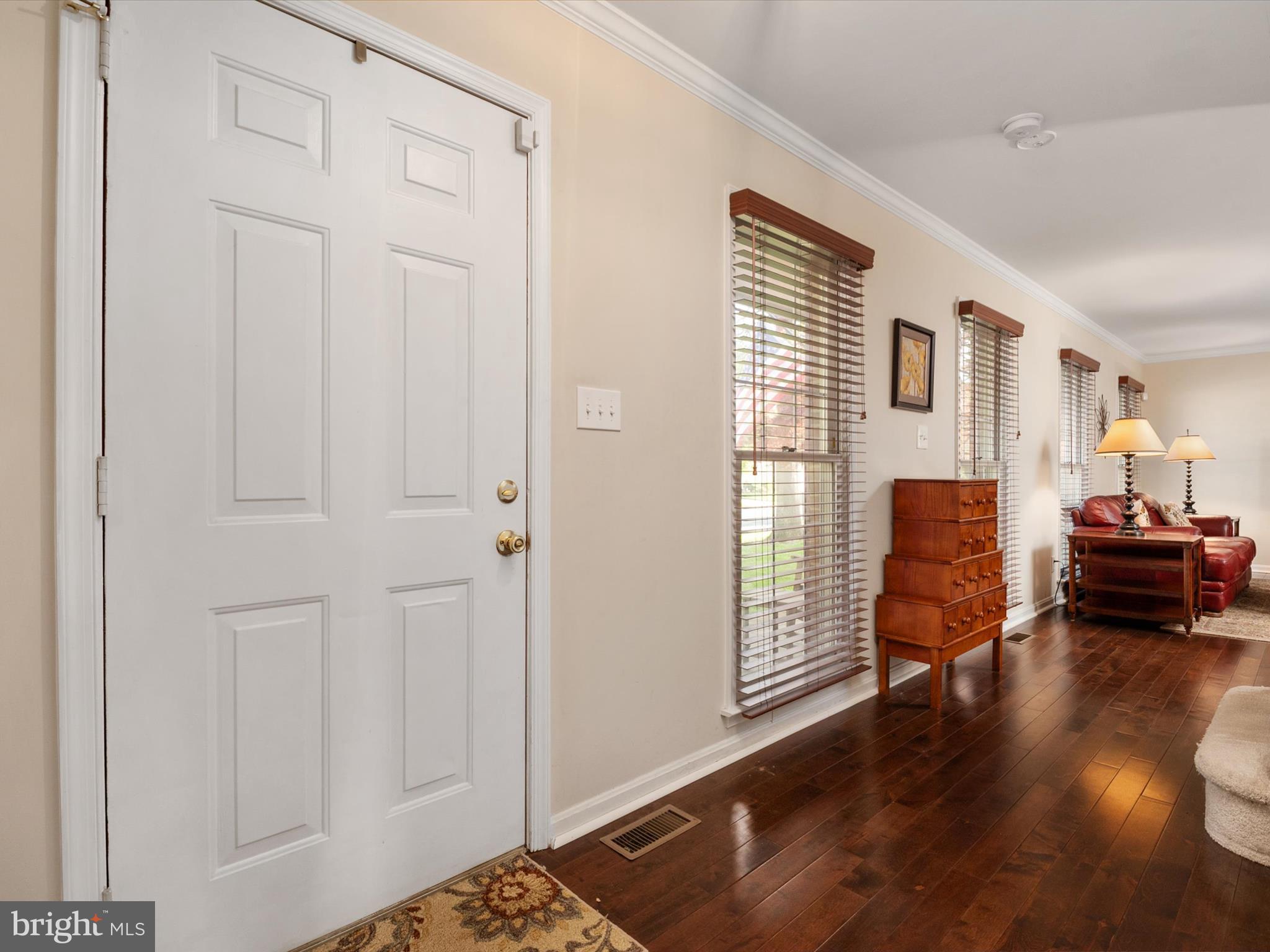 1711 Peartree Lane Crofton, MD 21114 - Photo 8 of 65 a living room with furniture and wooden floor