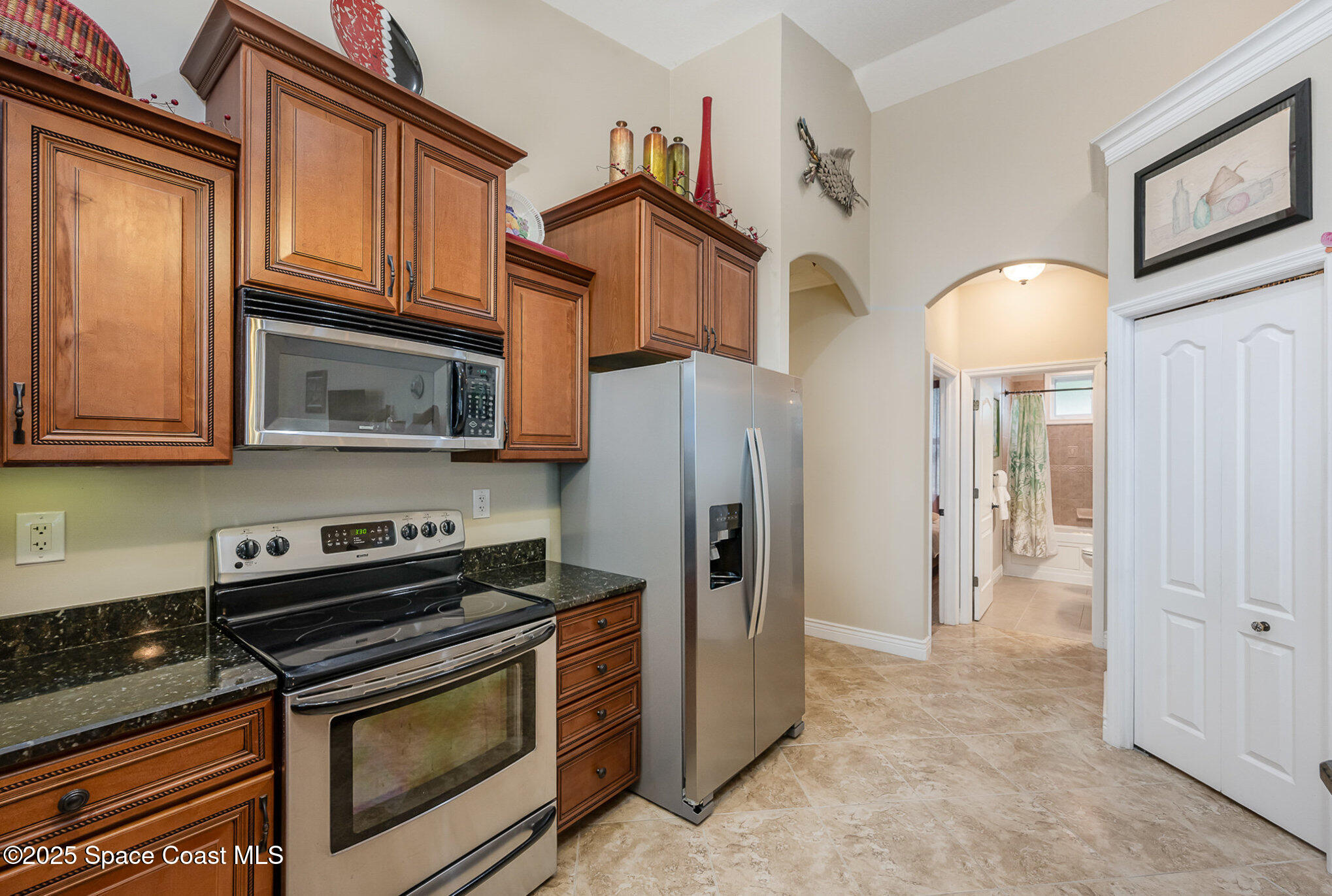 210 Sutton Street Rockledge, FL 32955 - Photo 11 of 39 Kitchen w/ Pantry