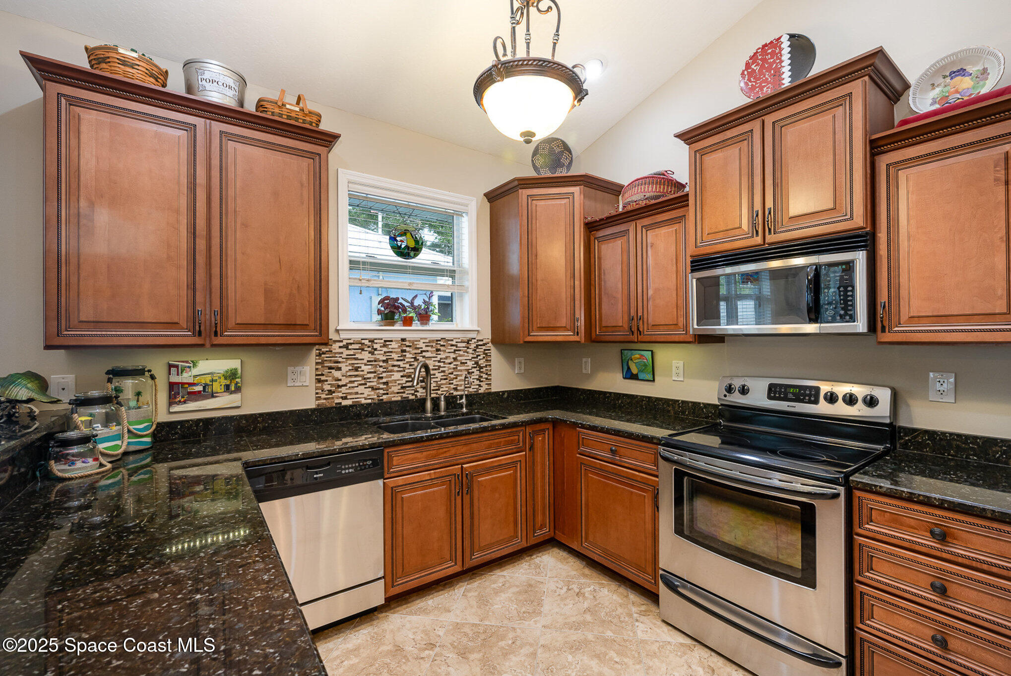 210 Sutton Street Rockledge, FL 32955 - Photo 7 of 39 Gourmet Kitchen w/ Stainless Appliances