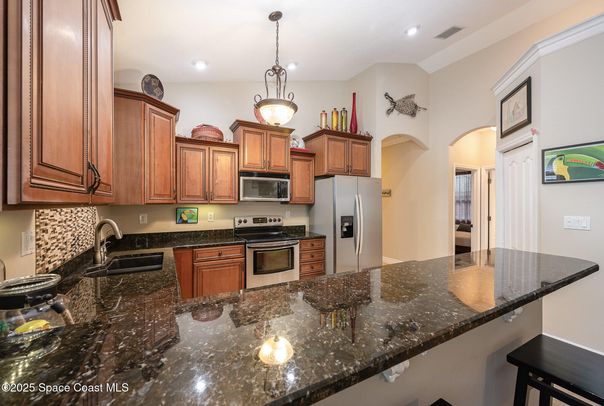 210 Sutton Street Rockledge, FL 32955 - Photo 8 of 39 Granite Counters & Eat At Bar