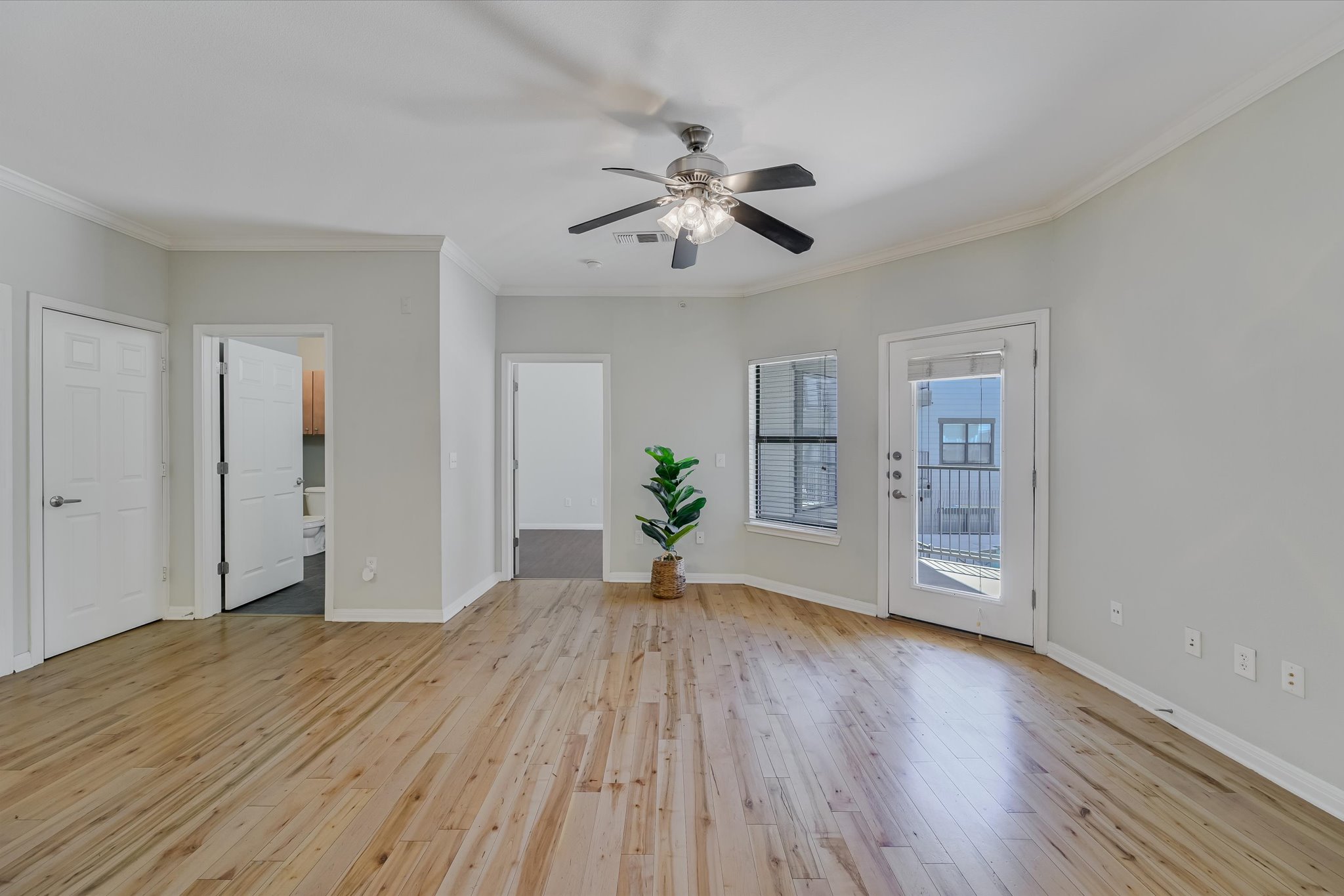 2502 Leon Street, Unit 301 Austin, TX 78705 - Photo 13 of 15 Large living area with door to patio.