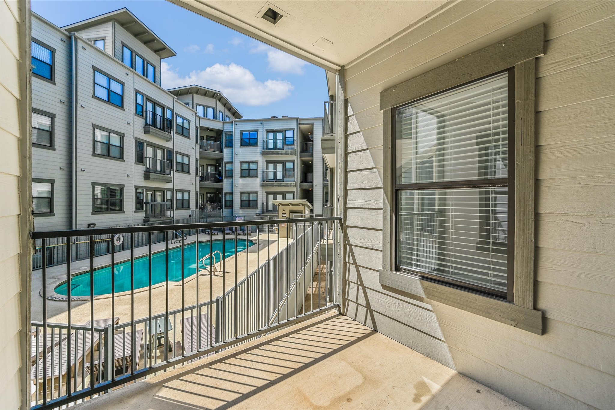 2502 Leon Street, Unit 301 Austin, TX 78705 - Photo 5 of 15 View of pool from patio