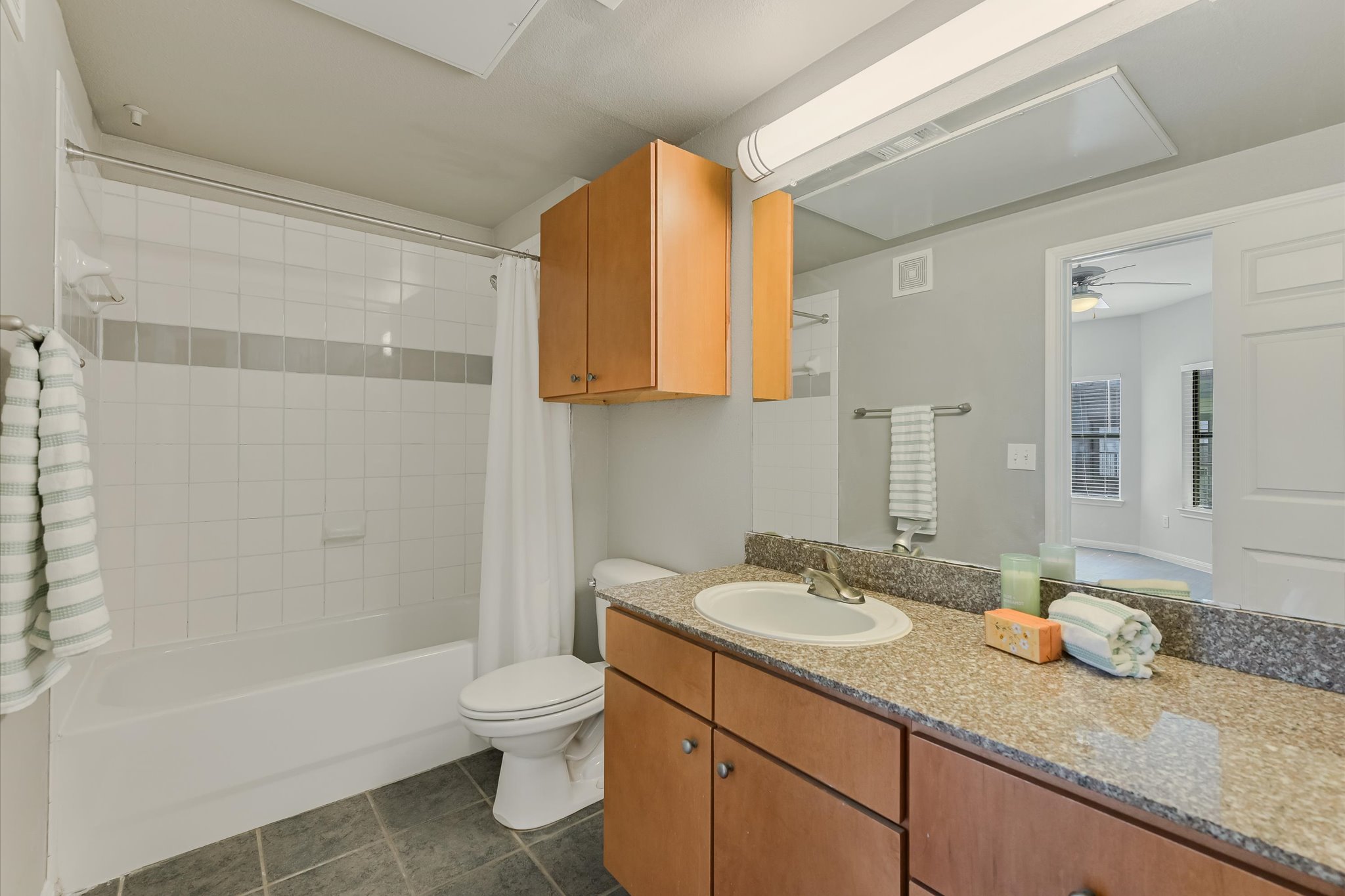 2502 Leon Street, Unit 301 Austin, TX 78705 - Photo 10 of 15 Mzin bathroom has dual sinks and walk in shower. Large closet for good storage.