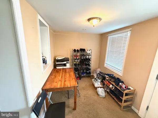 workspace with wooden floor and windows