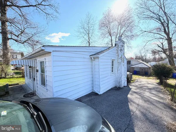 a view of a chairs and tables in the patio