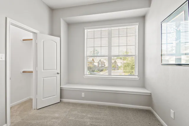 a spacious bathroom with a bathtub and a shower