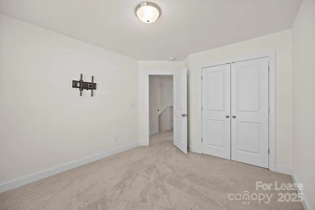 a view of a room with an empty space