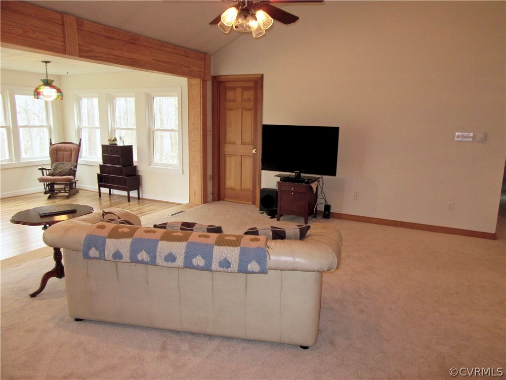 3092 Lowry Road Columbia, VA 23038 - Photo 9 of 34 a living room with furniture and a flat screen tv