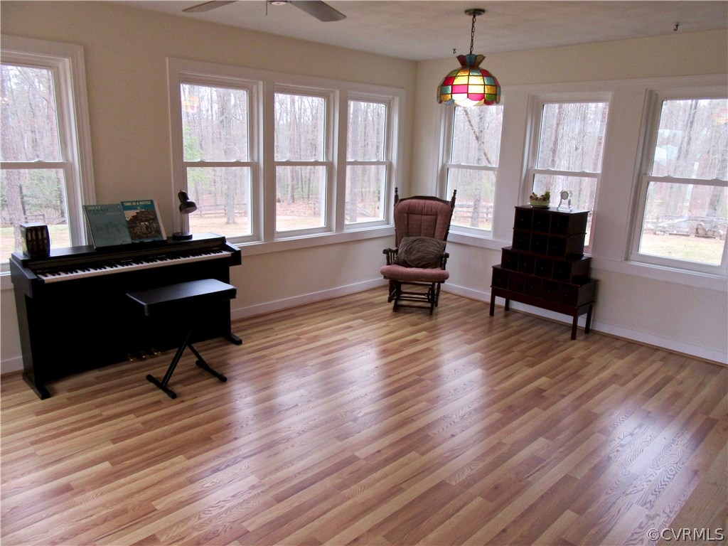 3092 Lowry Road Columbia, VA 23038 - Photo 10 of 34 a living room with furniture lamps and wooden floor