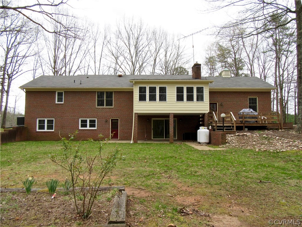 3092 Lowry Road Columbia, VA 23038 - Photo 22 of 34 a front view of house with yard having outdoor seating