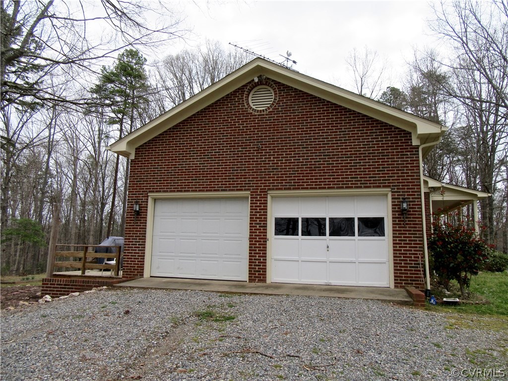 3092 Lowry Road Columbia, VA 23038 - Photo 23 of 34 a front view of a house with a yard