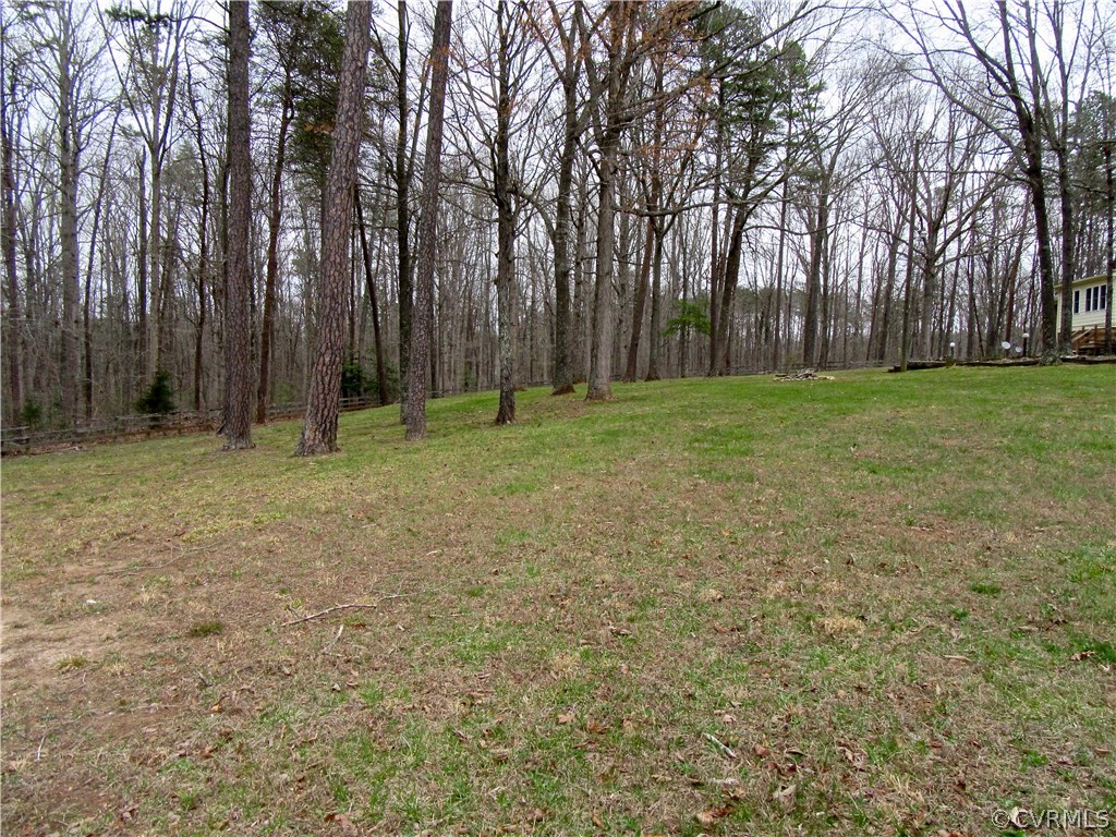 3092 Lowry Road Columbia, VA 23038 - Photo 27 of 34 a view of outdoor space with deck and yard
