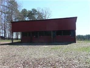 3092 Lowry Road Columbia, VA 23038 - Photo 32 of 34 a front view of a house with a yard