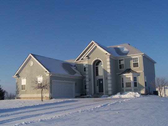 9007 Deborah Lane Spring Grove, IL 60081 - Photo 1 of 1 a front view of a house with a yard