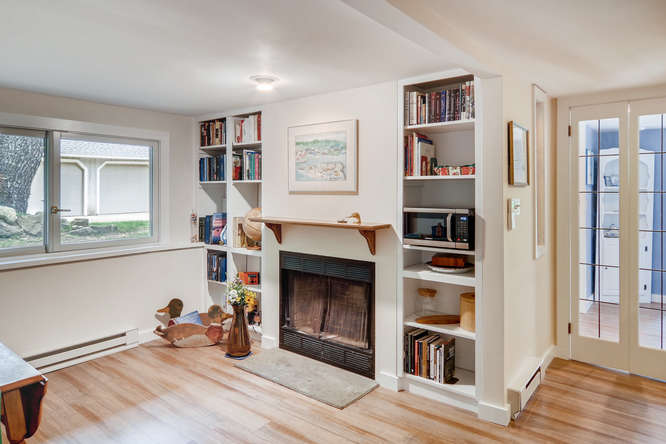 345 N Road Chilmark, MA 02535 - Photo 11 of 26 a view of a livingroom with furniture and a fireplace
